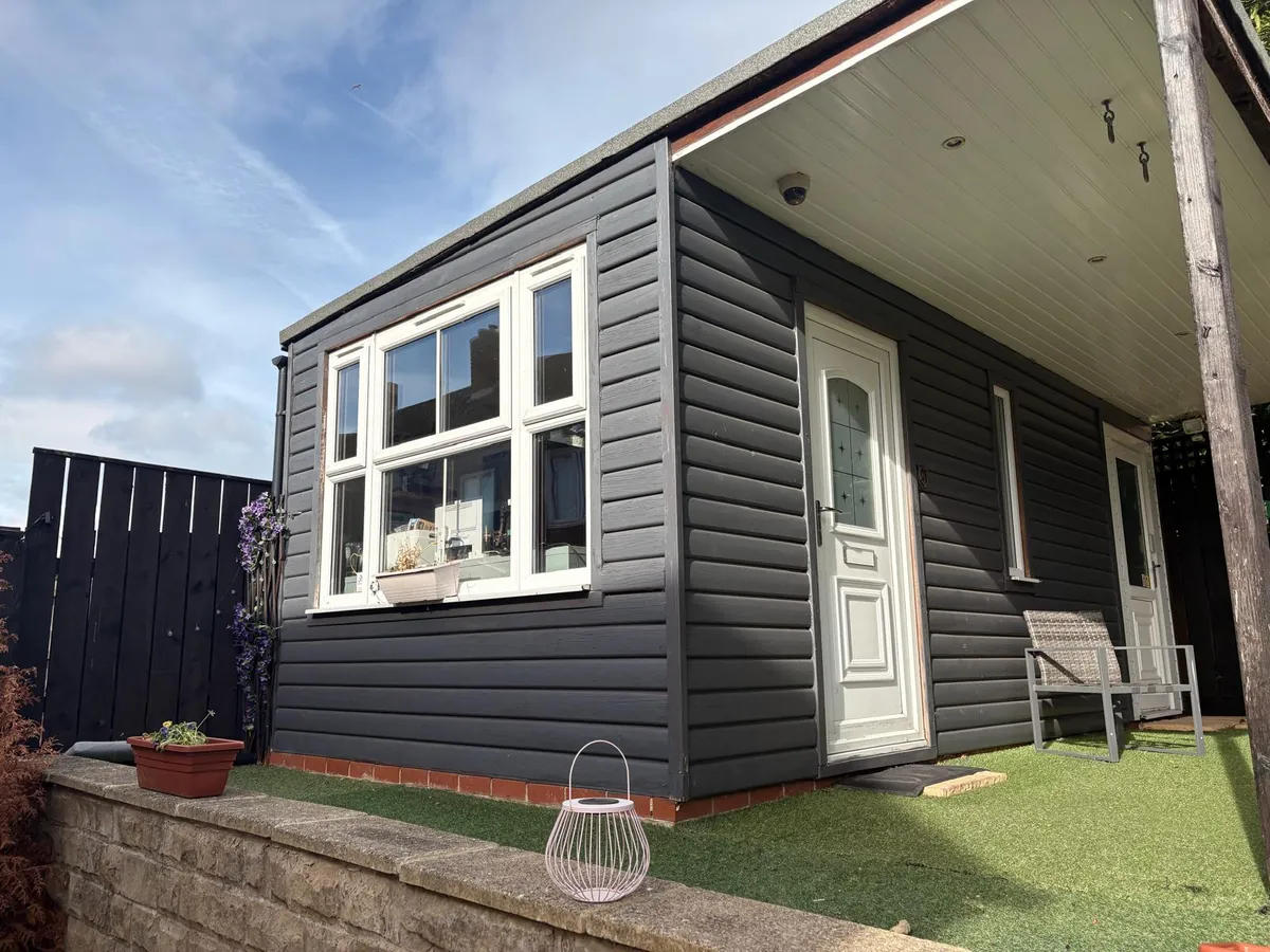 Outhouse converted into a staff office at a children's home, exterior after refurbishment